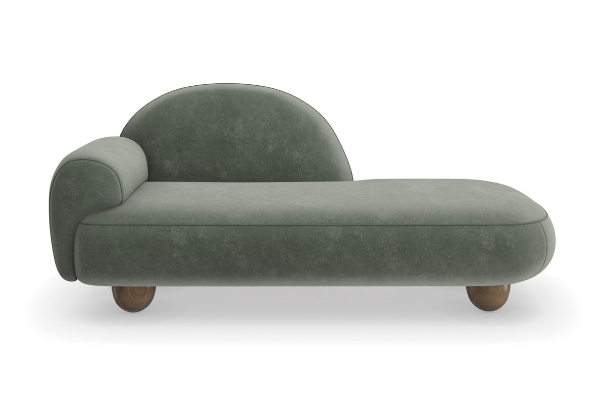The Cypress Chaise by Caracole (model M150-023-071-A) is a luxurious, Memphis-inspired piece that combines sculptural elegance with plush comfort. Its cloud-like silhouette and rich verdigris mohair-velvet upholstery make it a standout addition to any interior.