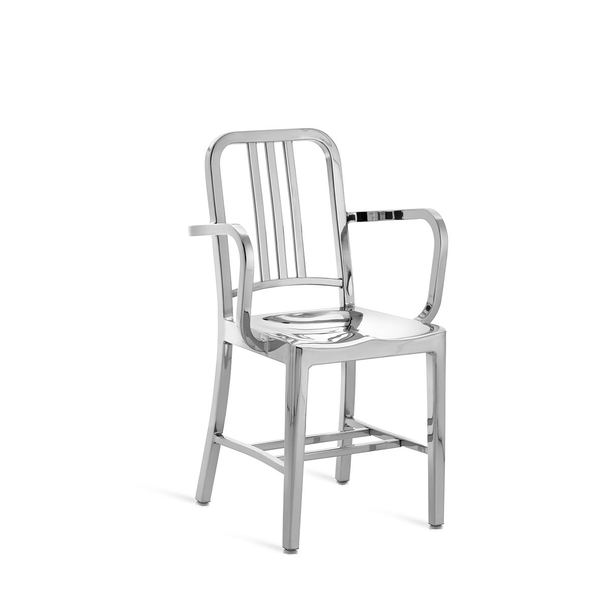 “Navy Armchair by Emeco with curved backrest and seamless welds, known for its durability and sleek profile.”