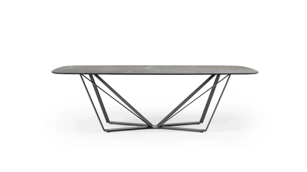 Papillon 72 by Reflex showcased in Royal Oak Michigan showroom, modern Italian luxury dining table with sculptural iron base and glass top.