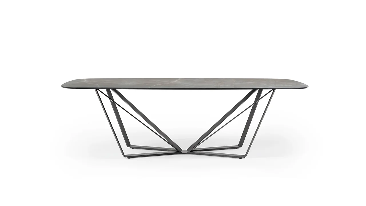Papillon 72 by Reflex showcased in Royal Oak Michigan showroom, modern Italian luxury dining table with sculptural iron base and glass top.