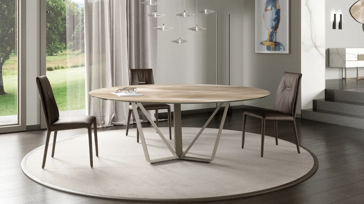 Papillon 72 by Reflex showcased in Royal Oak Michigan showroom, modern Italian luxury dining table with sculptural iron base and glass top.