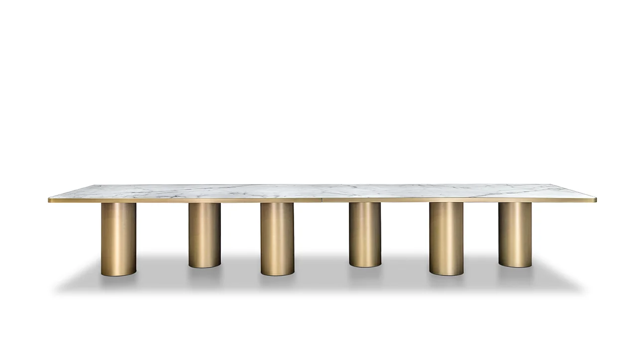 Signore Degli Anelli 72 Steel Bespoke dining table by Reflex Angelo, featuring ten sculptural cylinders in satin brass finish and a wooden top with Marmoreflex inlay.