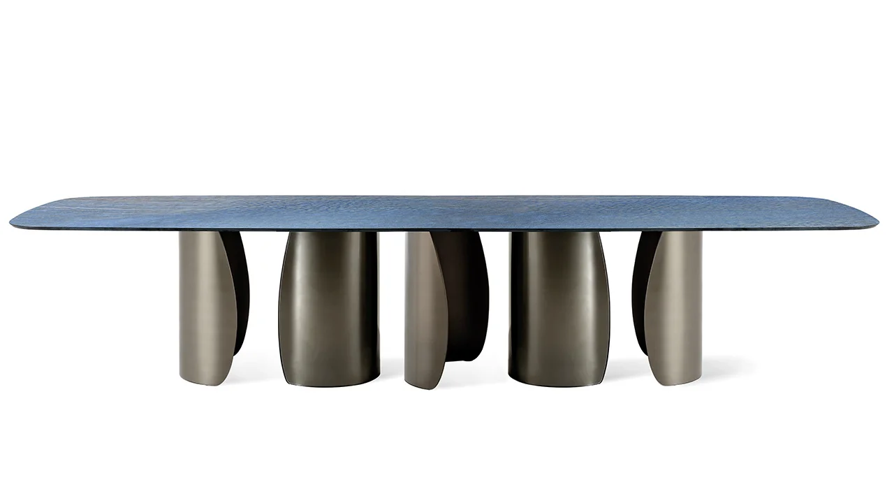 Petalo 72 Bespoke dining table by Reflex Angelo, designed by Tulczinsky, featuring sculptural curved glass bases with Bronze finish and a customizable MarmoReflex marble top.