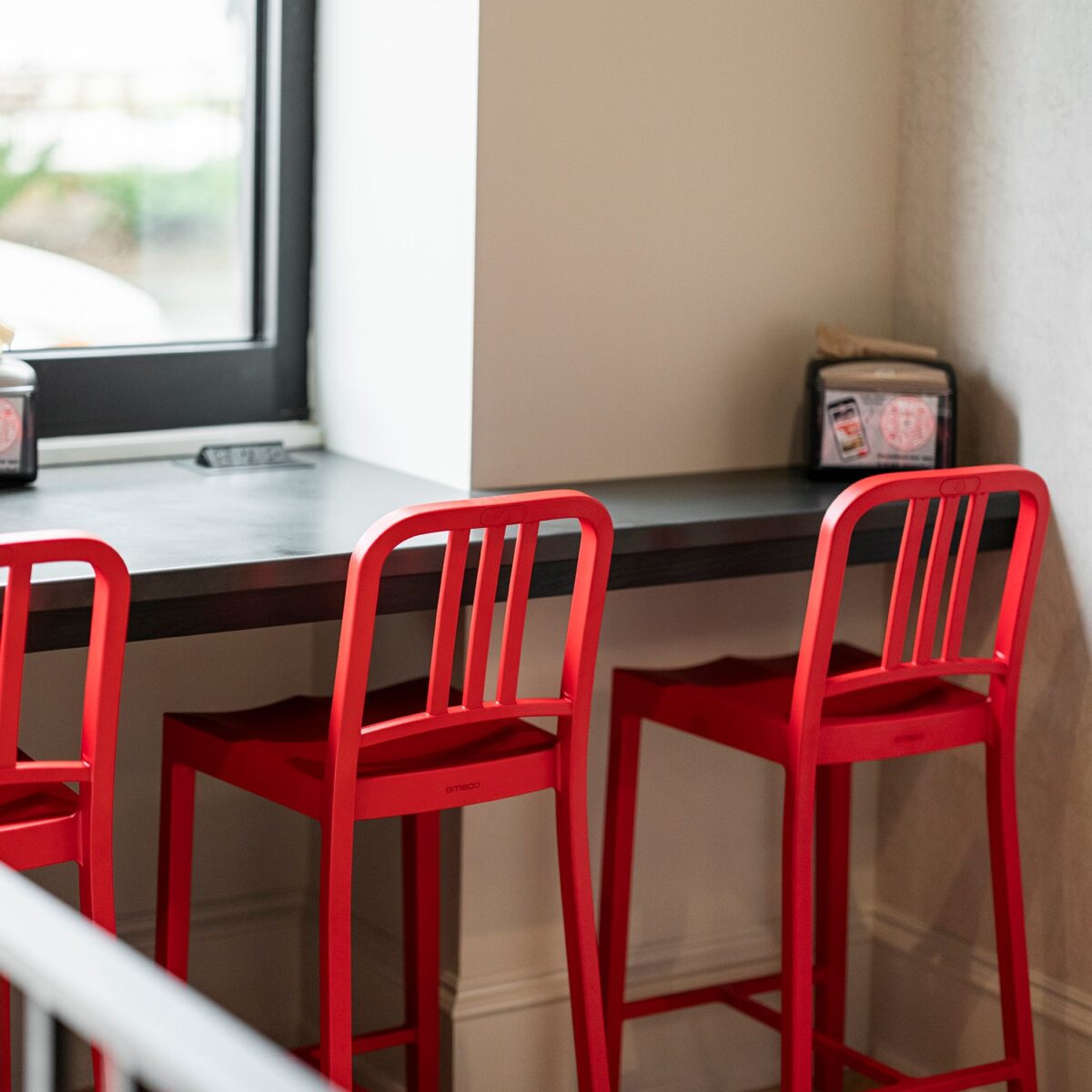 “Sleek and strong 111 Navy Stool by Emeco, perfect for bars and counters.”