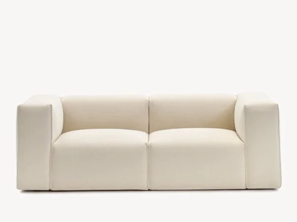 Spring by Moroso featuring a sculptural design with soft, rounded cushions and luxurious fabric upholstery.