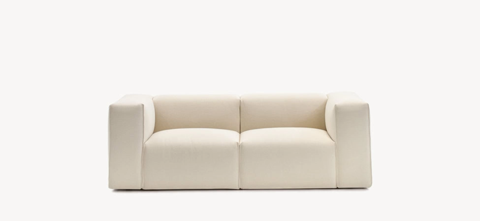 Spring by Moroso featuring a sculptural design with soft, rounded cushions and luxurious fabric upholstery.