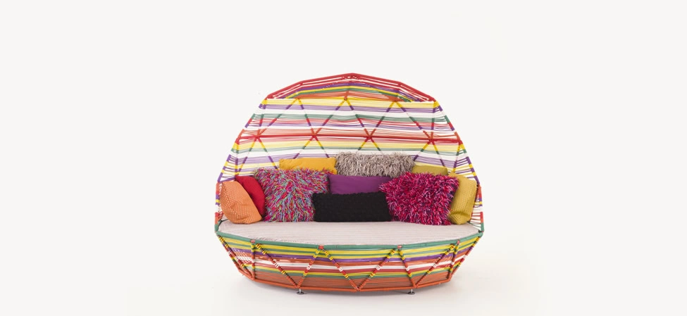 Tropicalia by Moroso. Tropicalia seating with colorful polymer cord weave on a sleek tubular steel frame, combining modern design with playful texture.