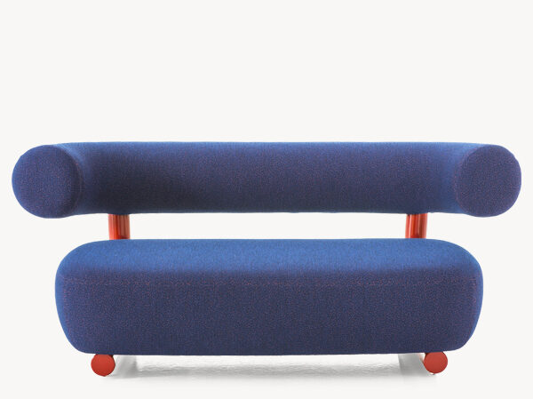 Side view of the Pipe sofa by Moroso, showcasing its elegant steel frame and deep, inviting cushions.