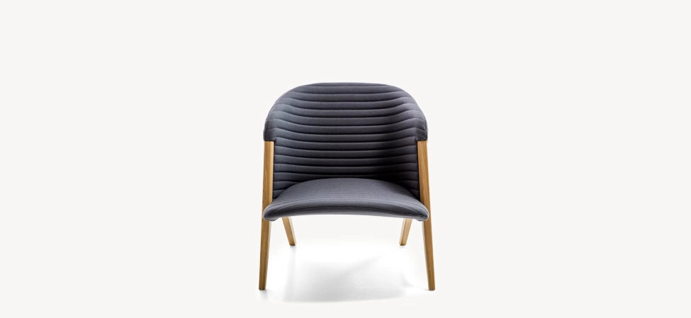 Mafalda by Moroso in sculptural Italian fabric with rounded form, front view in a Royal Oak Michigan showroom