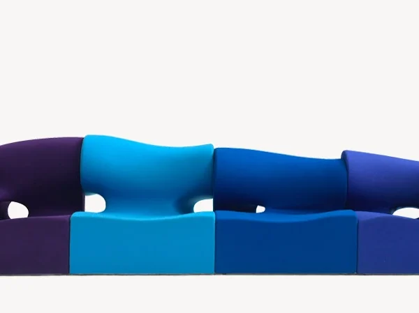 Misfits Sofa by Moroso side profile highlighting sinuous curves and deep seating in a Troy Michigan setting