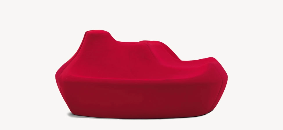 Saruyama Sofa by Moroso featuring sculptural monolithic form and rounded seat, front view in a Royal Oak Michigan showroom