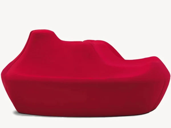 Elegant lounge chair with a unique curved base and soft upholstery, Saruyama by Moroso in a rich color.
