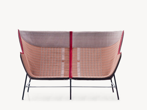 Moroso Paper Planes sofa in grid-patterned textile, blending precise geometry with minimalist elegance.