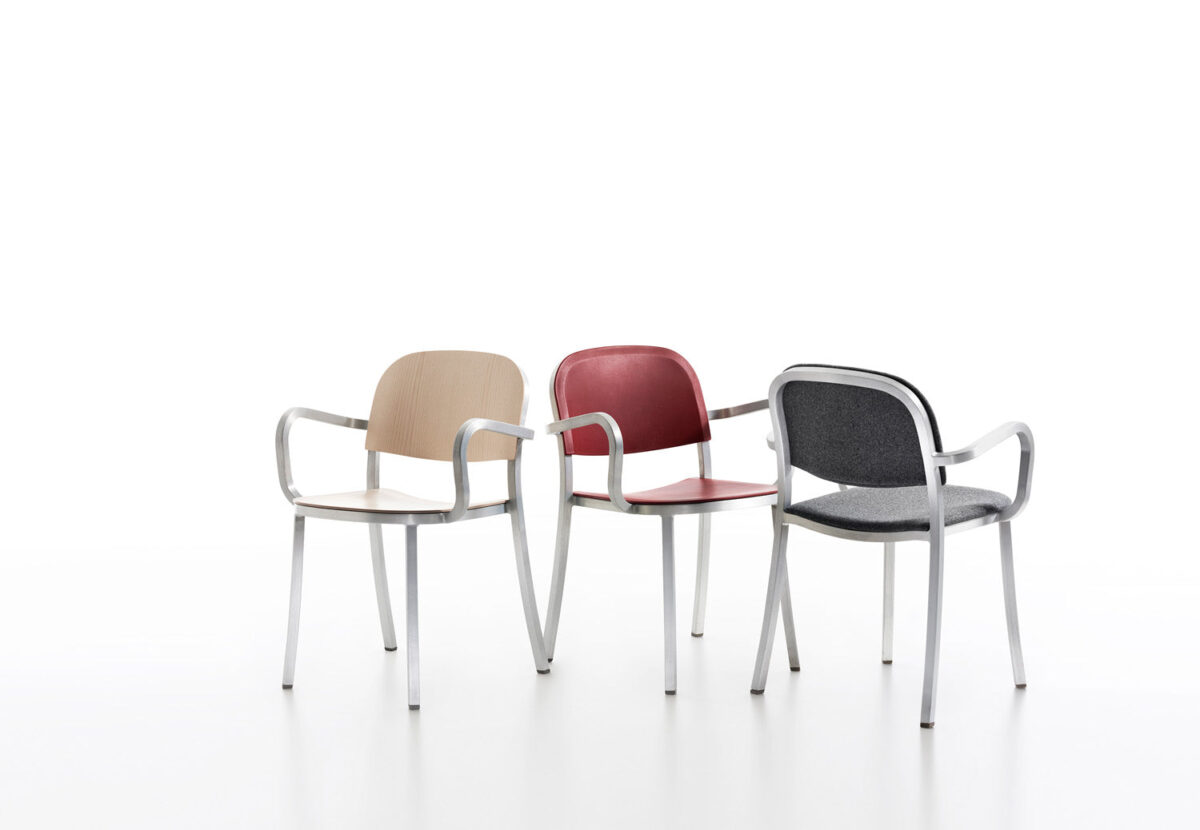 “Comfortable and sustainable Emeco armchair with recycled plastic seat and sleek arms.”