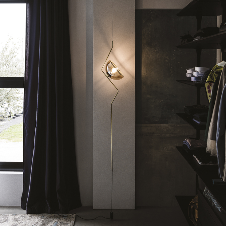 “TRAMONTO by Cattelan Italia – modern Italian wall lamp with layered disc design and soft, diffused ambient lighting”