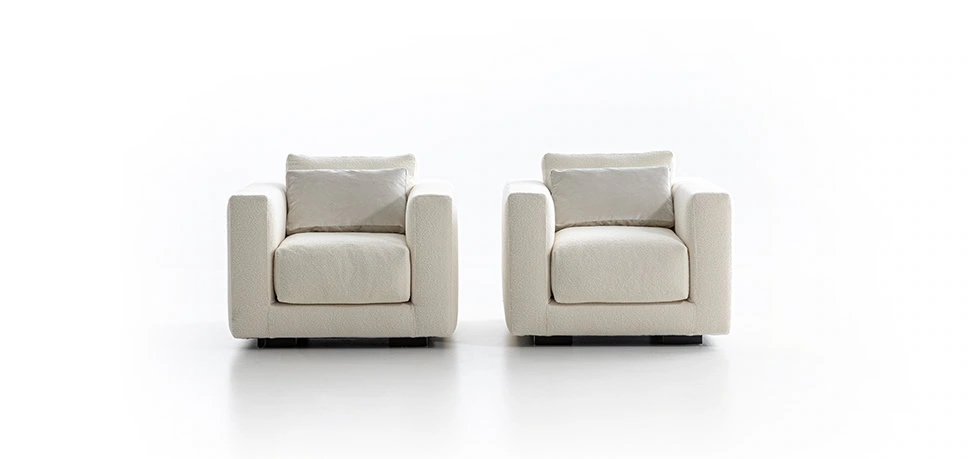 Salon Nanà by Moroso in plush Italian fabric with tufted backrest, front view in a Royal Oak Michigan showroom