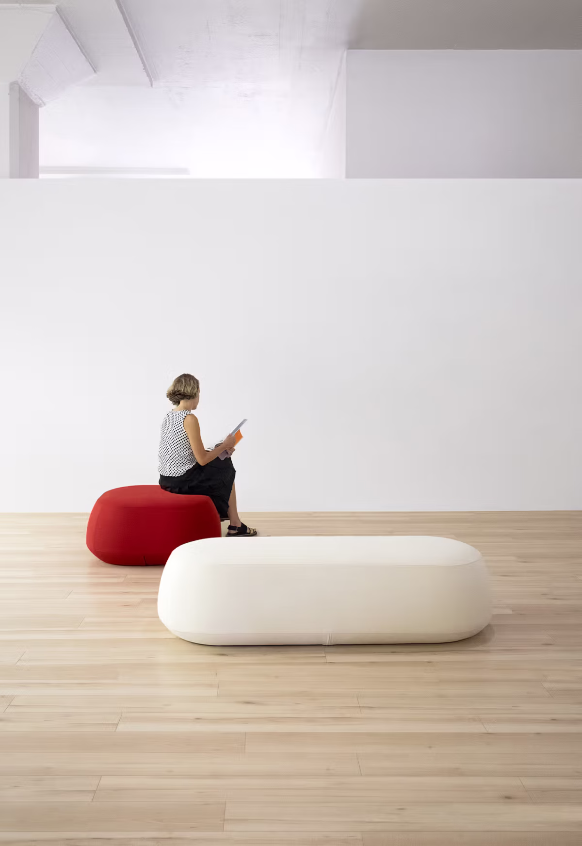 Contemporary interior with Ile Pouf by Bensen styled as extra seating in a cozy lounge area