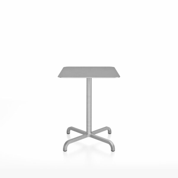 “Emeco 20-06 café table featuring a sleek square top and sturdy legs.”