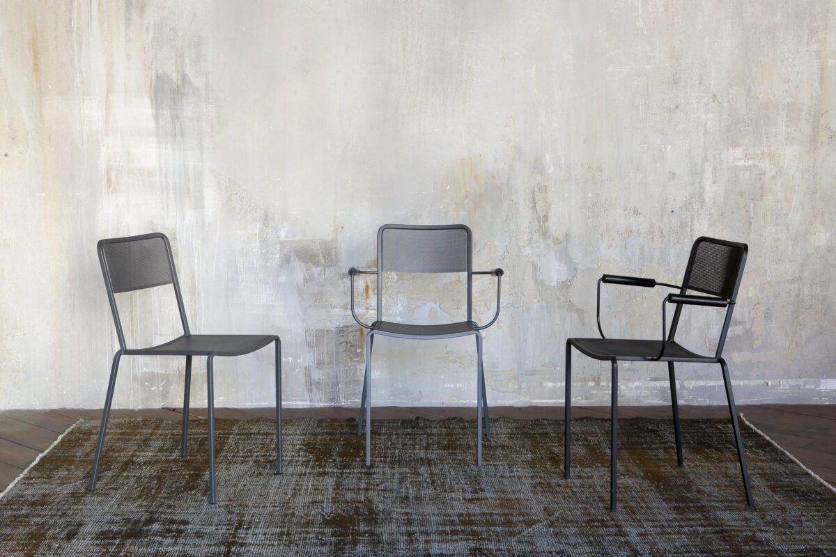 “Ginger 2018 Armchair in inox version with sandblasted expanded stainless steel seat and back, showcasing its sleek and modern look.”