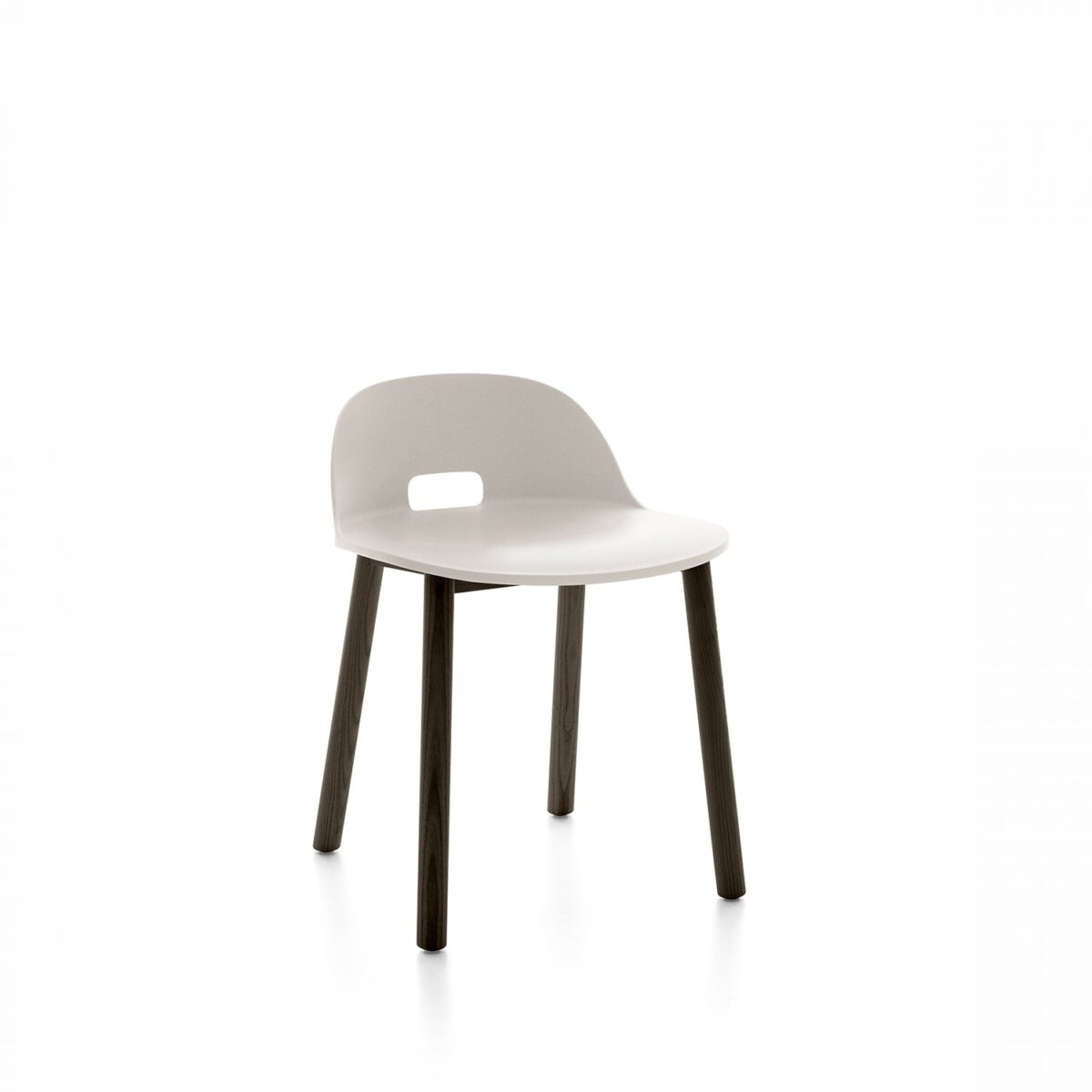 “Modern Alfi Chair with low backrest, designed by Jasper Morrison for Emeco, combining comfort and sustainability.”