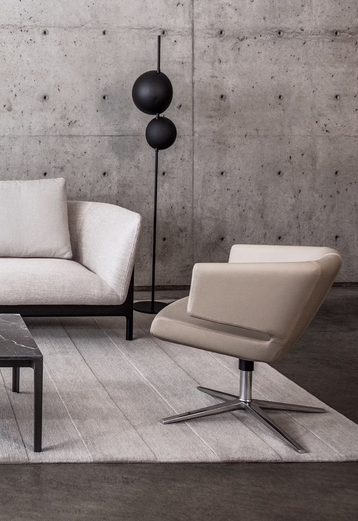 Close-up of Lotus by Bensen highlighting fabric texture and detailed stitching on the curved backrest