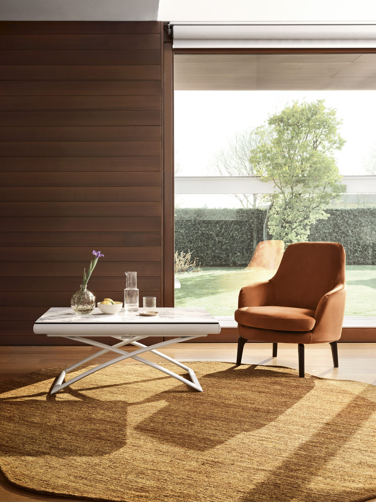 A set of MEDEA chairs by Calligaris arranged around a dining table, demonstrating their ability to bring a touch of refined luxury and contemporary style to any dining space.