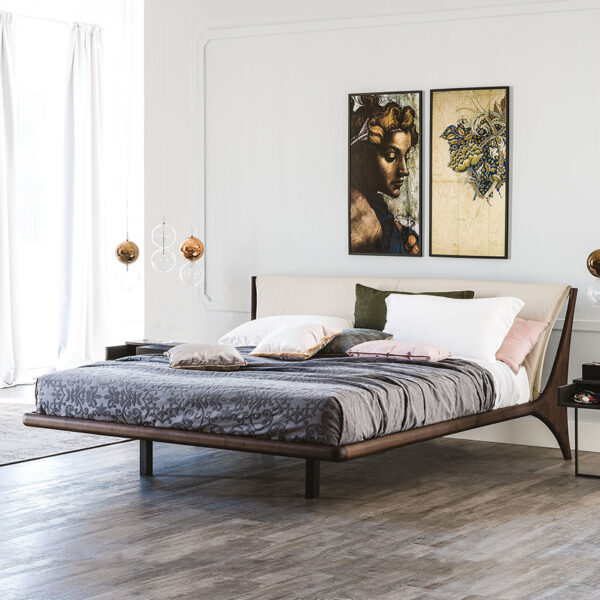 “Cattelan Italia NELSON – luxury designer bed featuring a low-profile frame and extended headboard with built-in side panels”