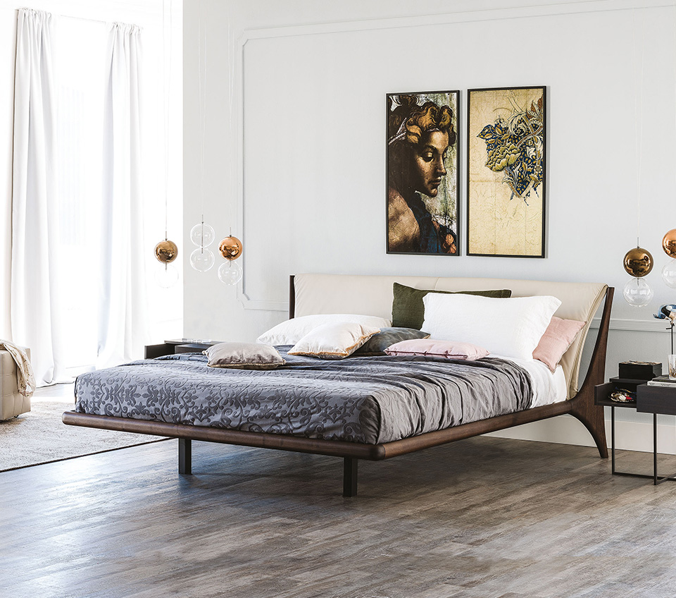 “Cattelan Italia NELSON – luxury designer bed featuring a low-profile frame and extended headboard with built-in side panels”