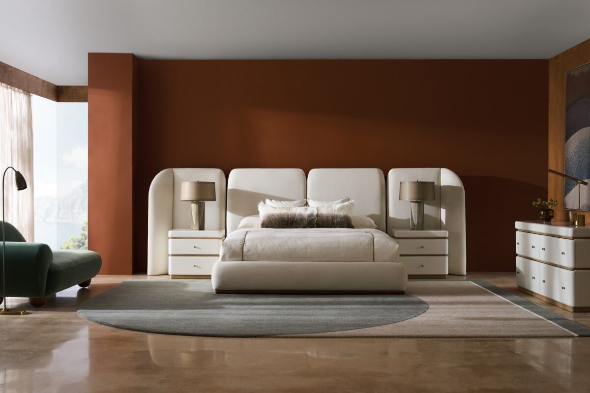 Caracole Malta Upholstered King Bed featuring a fully upholstered frame in deep-pile microfiber, complemented by a Toasted Pecan wood base, with softly rounded edges and a soothing symmetrical design.