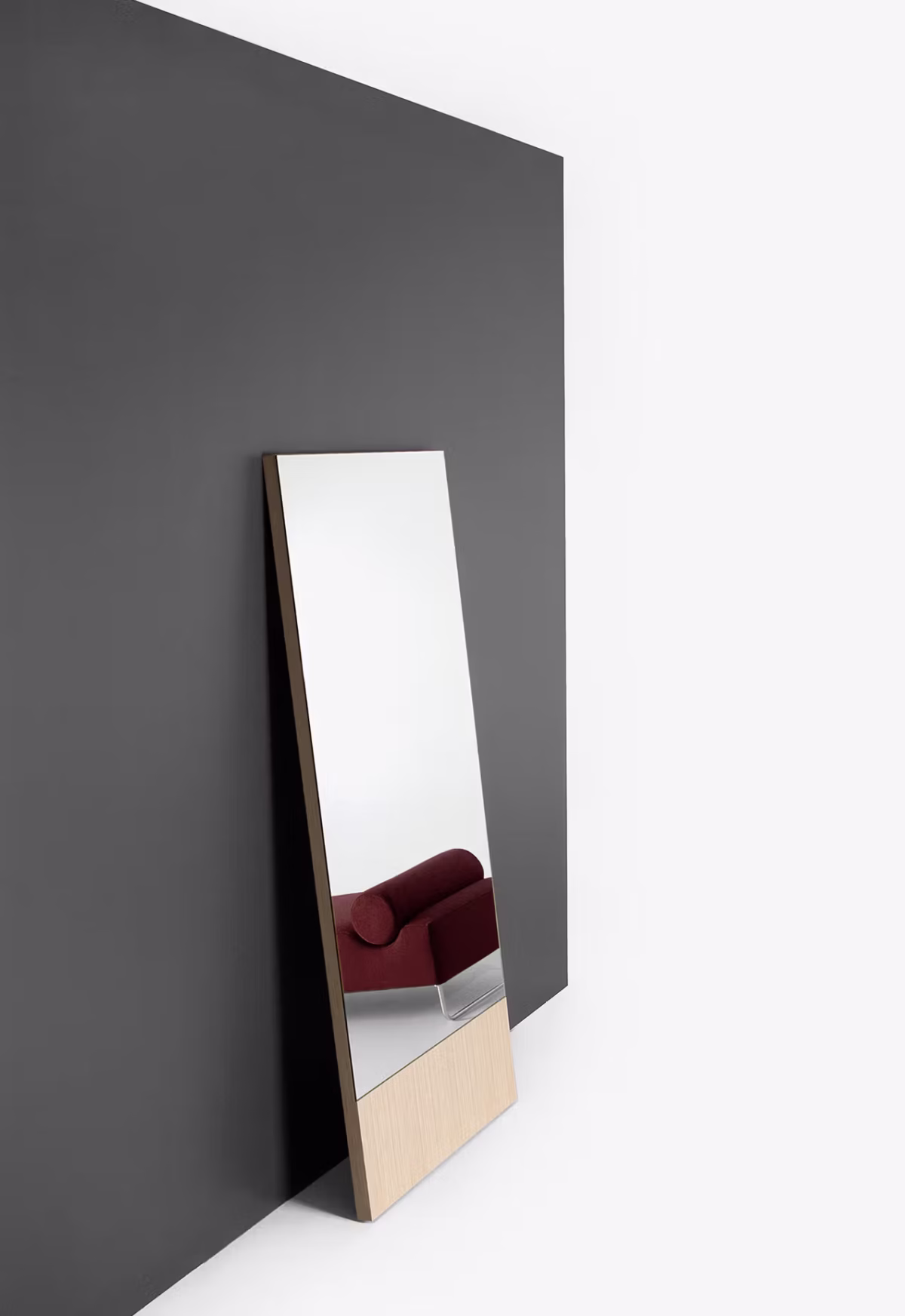 Side view of Lean by Bensen showcasing its ergonomic reclined shape and minimalist silhouette