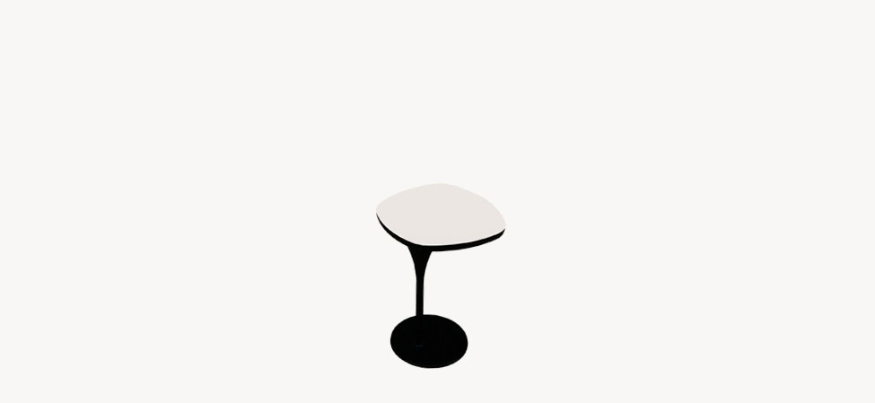 Bloomy Coffee Table by Moroso featuring black varnished steel base and Laminam® top, front view in a Royal Oak Michigan showroom