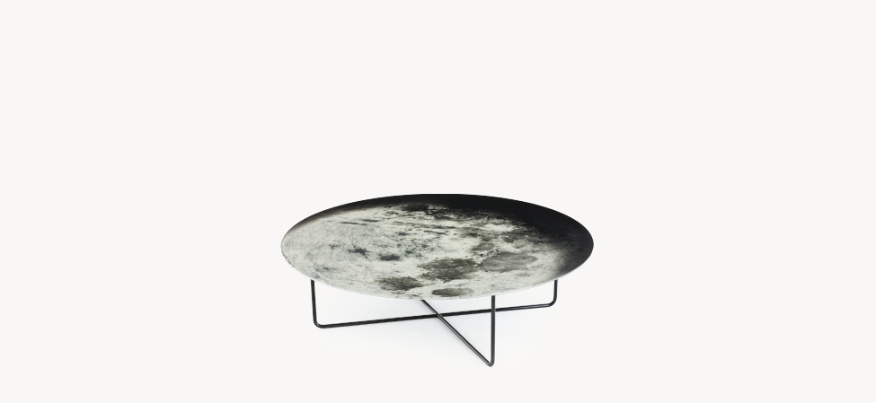 My Moon My Mirror Table by Moroso in sculptural round form with reflective top, front view in a Royal Oak Michigan showroom