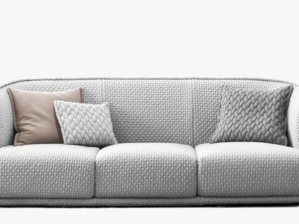 Close-up of the Round sofa’s smooth fabric and rounded structure, providing maximum comfort in a contemporary space.