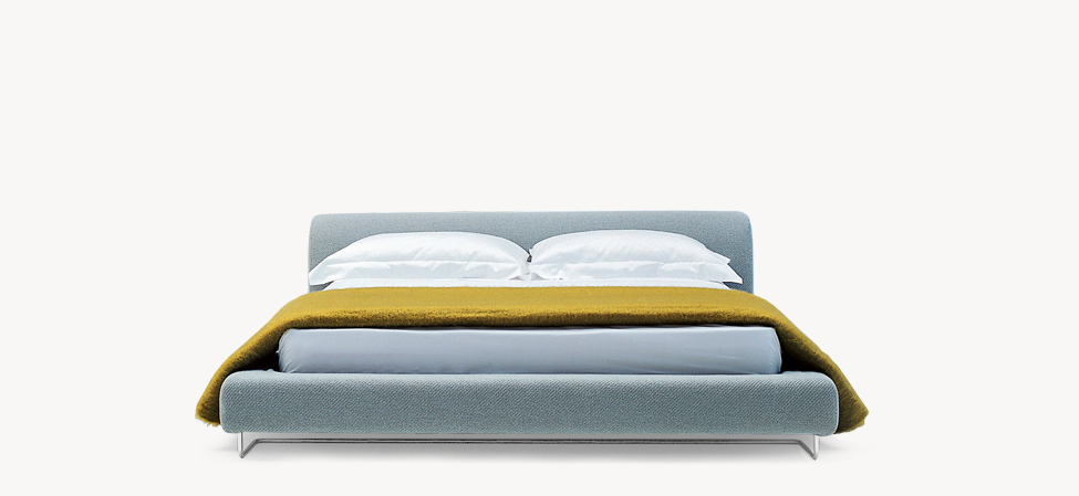 Lowland bed with upholstered headboard and sides, filled with polyurethane foam on a wooden structure