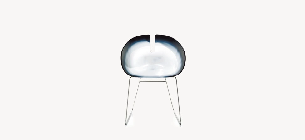 Fjord H by Moroso in sculptural Italian aluminum frame with plush upholstery, front view in a Royal Oak Michigan showroom