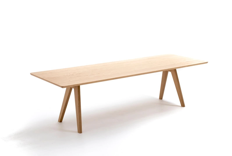 Mathilda Table by Moroso in solid oak with natural finish, front view in Royal Oak Michigan showroom