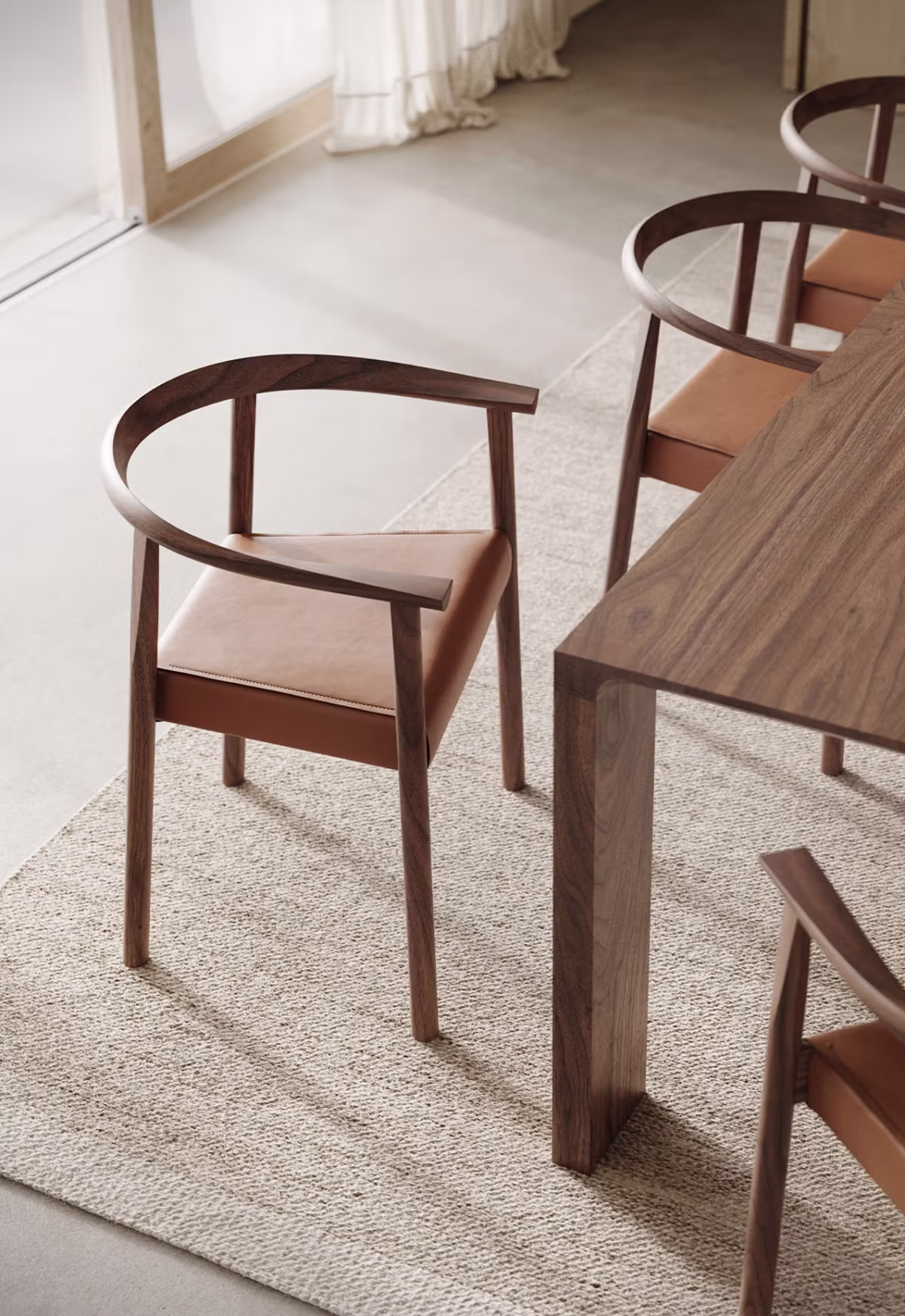 Tokyo by Bensen in walnut finish with neutral cushions