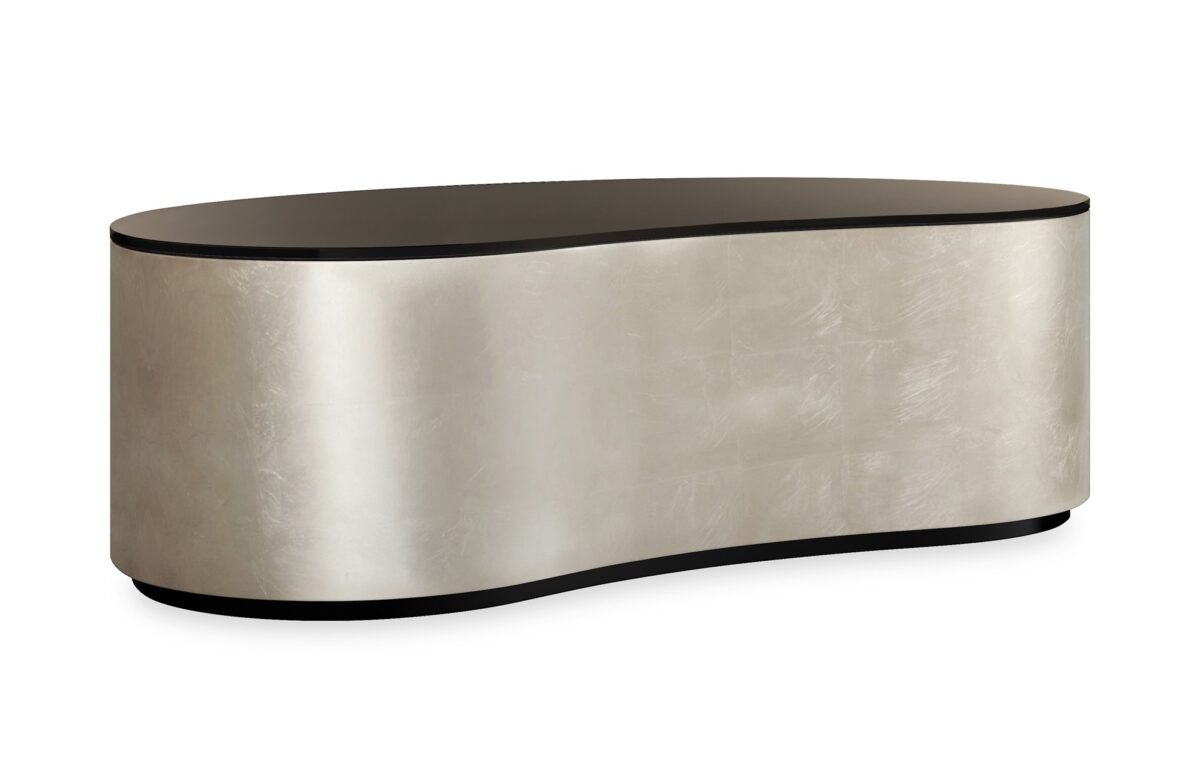 Adele Cocktail Table by Caracole — a sleek rectangular cocktail table with a glass top and polished metal frame.