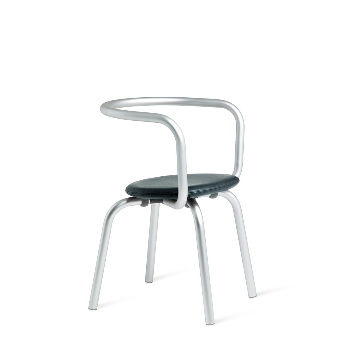 “Side view of the Parrish Chair by Emeco, designed with simplicity and comfort in mind.”