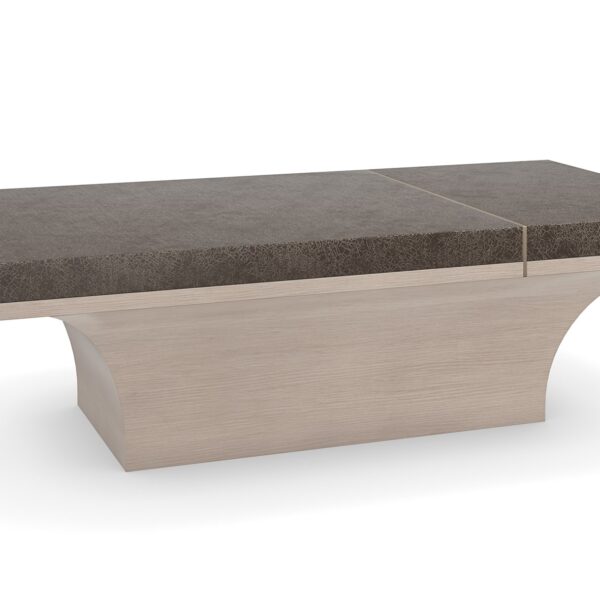 Minimalist Caracole cocktail table with dark wood tones and subtle floating effect.