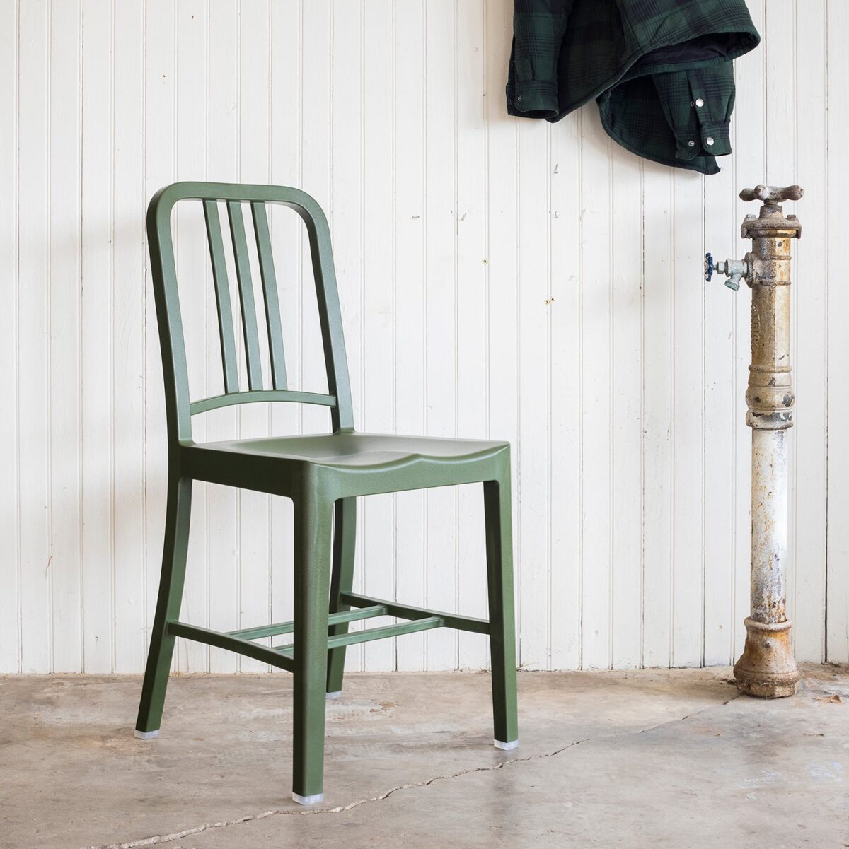 “Lightweight yet strong 111 Navy Chair® by Emeco, designed for long-lasting performance.”