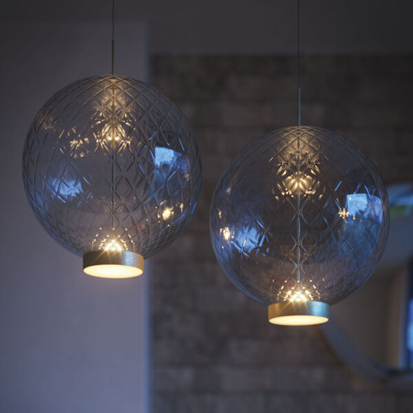 “Cattelan Italia OHAY – designer decorative lamp featuring a smooth organic form and soft ambient lighting”