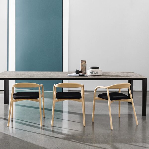 “Kodo Table by Sovet – modern Italian dining table with bold sculptural base and elegant round top”
