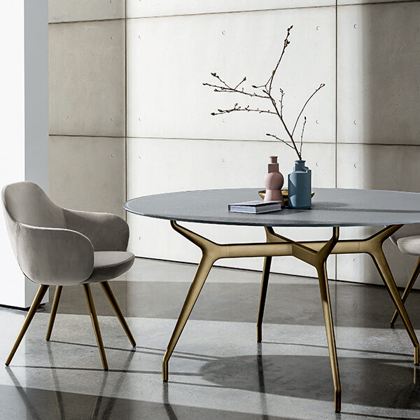 “Arkos Round Table by Sovet – sleek minimalist Italian design with soft geometric silhouette”