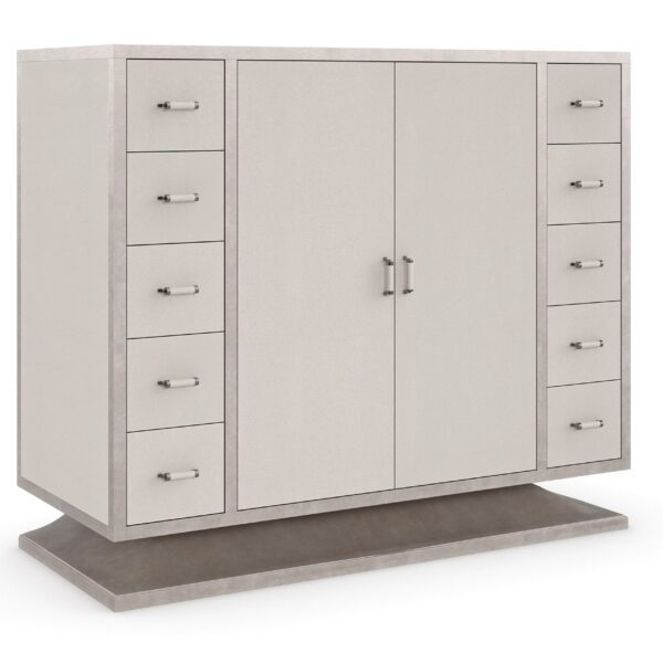 What's In Store by Caracole — a tall storage cabinet with elegant doors and metallic hardware.