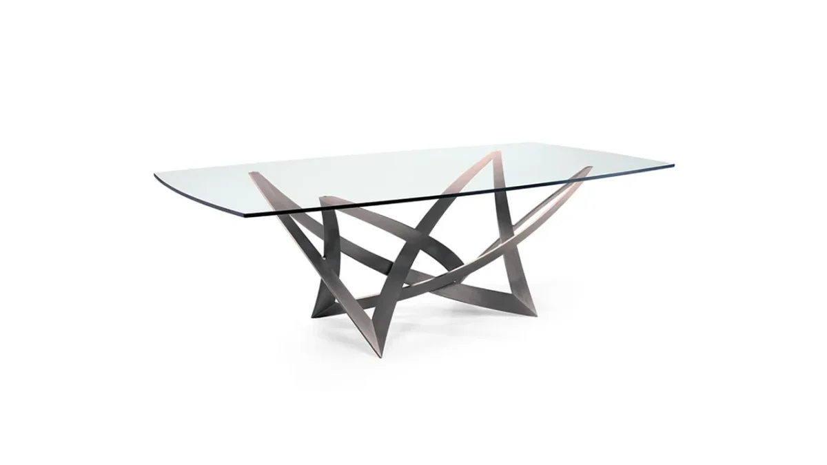 Infinito 72 by Reflex showcased in Royal Oak Michigan showroom, modern Italian luxury dining table with sculptural forged iron base and glass top.