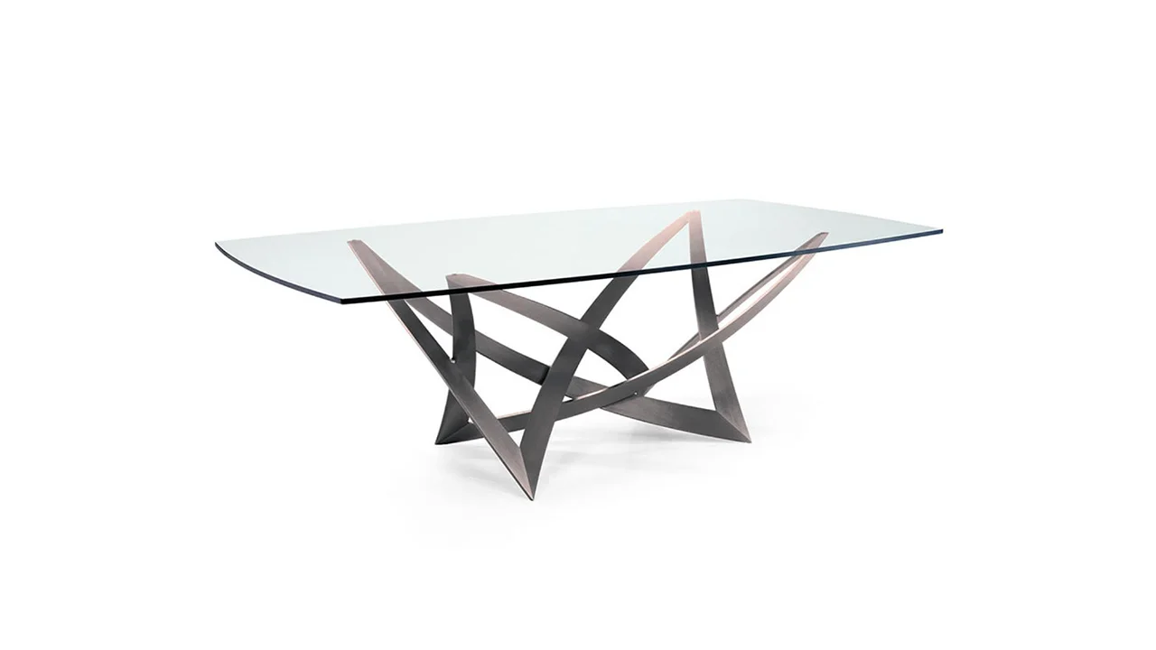 Infinito 72 by Reflex showcased in Royal Oak Michigan showroom, modern Italian luxury dining table with sculptural forged iron base and glass top.