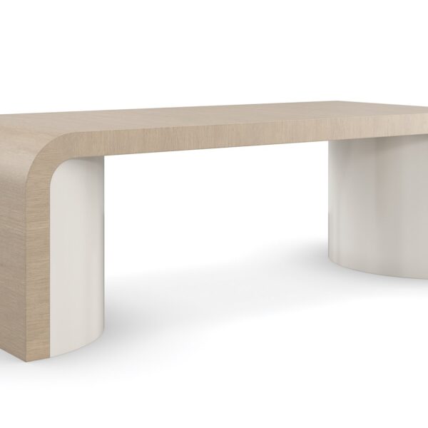 Movement Cocktail Table by Caracole featuring a sculptural base and smooth top.