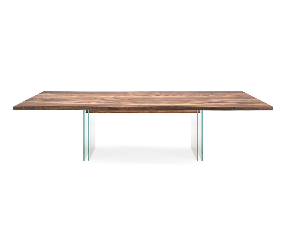 “Side view of IKON by Cattelan Italia – modern round table featuring artistic base design and sleek circular top”