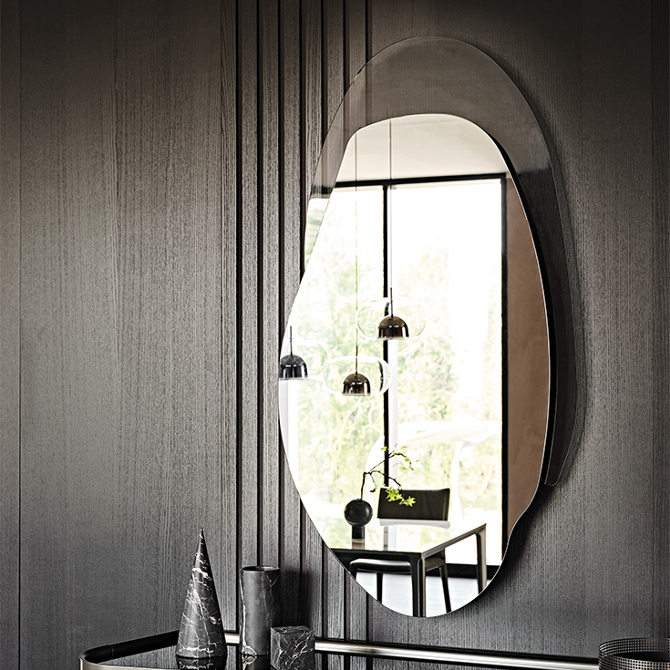 “Cattelan Italia AKUMAL – contemporary lounge chair featuring minimalist design and luxury fabric or leather upholstery”